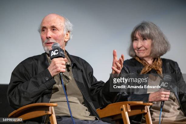 Director Alan Rudolph (L and producer Carolyn Pfeiffer attend the book signing with Carolyn Pfeiffer for "Chasing The Panther" and the special...