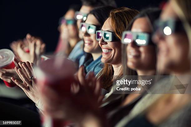 audience watching movie with 3-d glasses. - 3d adult movie stockfoto's en -beelden
