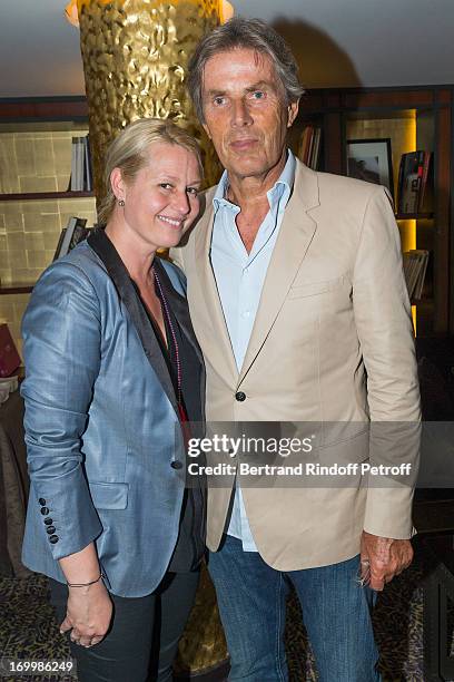 Dominique Desseigne, CEO of Lucien Barriere Group and Luana Belmondo attend a cocktail party at Hotel Fouquet's Barriere following the premiere of...