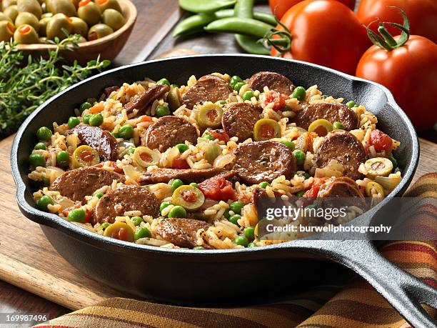 chorizo and spanish rice skillet dinner - paella stockfoto's en -beelden