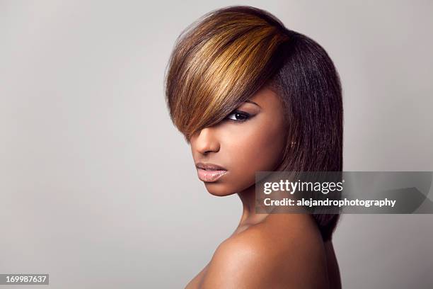 3/4 close-up of a model with highlight bang - high fashion hair stock pictures, royalty-free photos & images