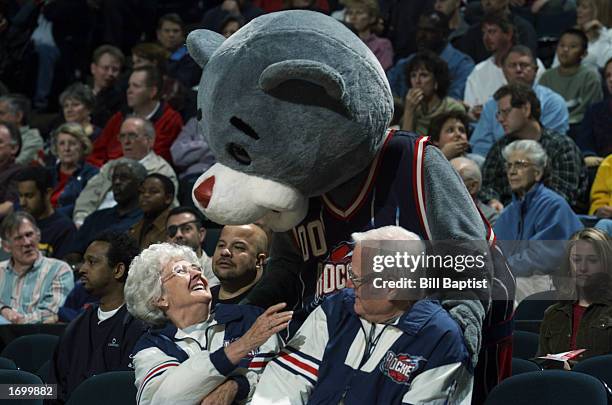 Rockets' mascot, Clutch, greets the fans during the NBA game between the Los Angleles Clippers and the Houston Rockets at Compaq Center on December...