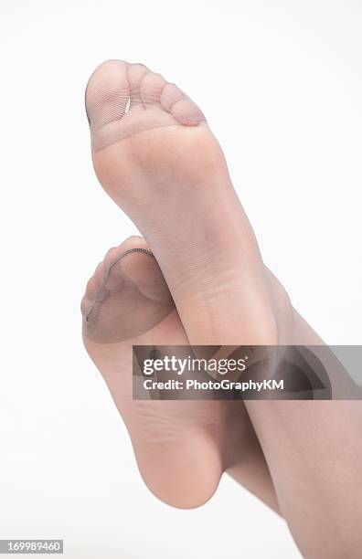 sexy feet - nylon feet stock pictures, royalty-free photos & images