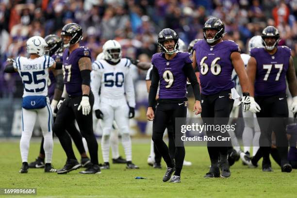 Place kicker Justin Tucker of the Baltimore Ravens reacts after missing a field goal during the closing seconds of regulation against the...