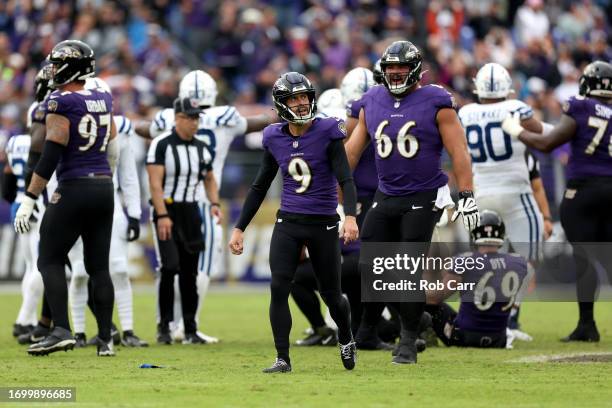 Place kicker Justin Tucker of the Baltimore Ravens reacts after missing a field goal during the closing seconds of regulation against the...