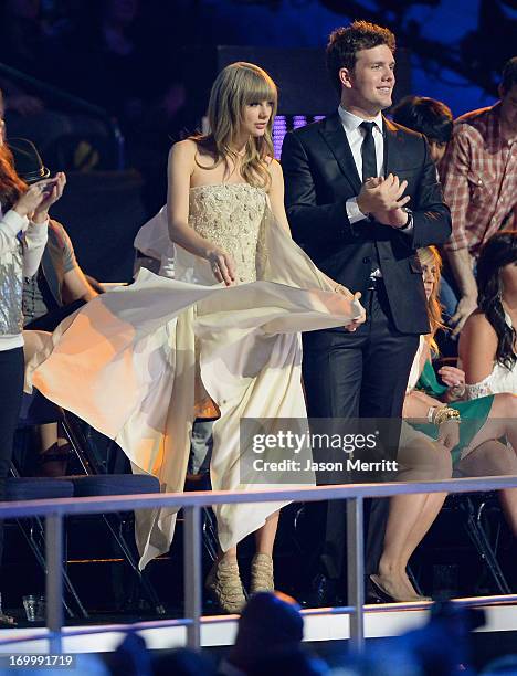 Taylor Swift and Austin Swift attend the 2013 CMT Music awards at the Bridgestone Arena on June 5, 2013 in Nashville, Tennessee.