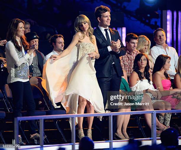 Taylor Swift and Austin Swift attend the 2013 CMT Music awards at the Bridgestone Arena on June 5, 2013 in Nashville, Tennessee.
