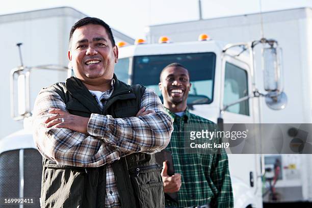 multi-ethnic truck drivers - truck driver stock pictures, royalty-free photos & images