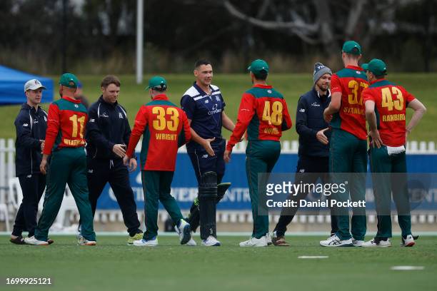 Players shake hands after the Marsh One Day Cup match between Victoria and Tasmania at CitiPower Centre, on September 25 in Melbourne, Australia.