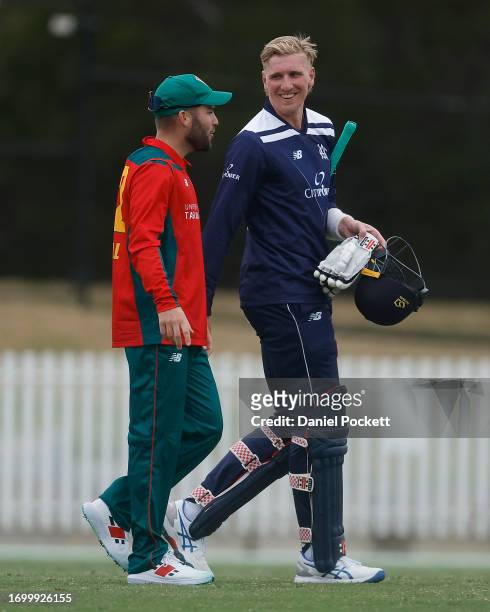Will Sutherland of Victoria chats with Caleb Jewell of Tasmania after the Marsh One Day Cup match between Victoria and Tasmania at CitiPower Centre,...
