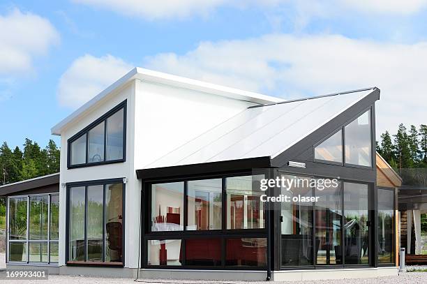 modern scandinavian style villa - glass building exterior stock pictures, royalty-free photos & images