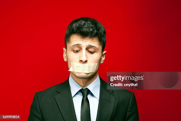 shut up! - taped mouth - duct tape stock pictures, royalty-free photos & images