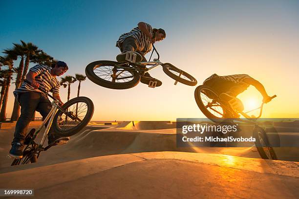 bmx biker - multiple exposure sports stock pictures, royalty-free photos & images