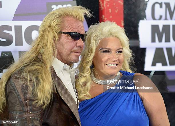 Television personalities Beth Smith and Dog the Bounty Hunter attend the 2013 CMT Music awards at the Bridgestone Arena on June 5, 2013 in Nashville,...