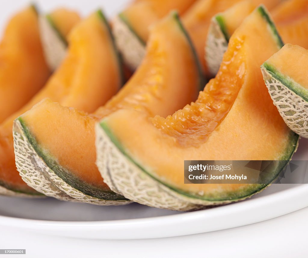 Sliced cantaloupe melons on a plate