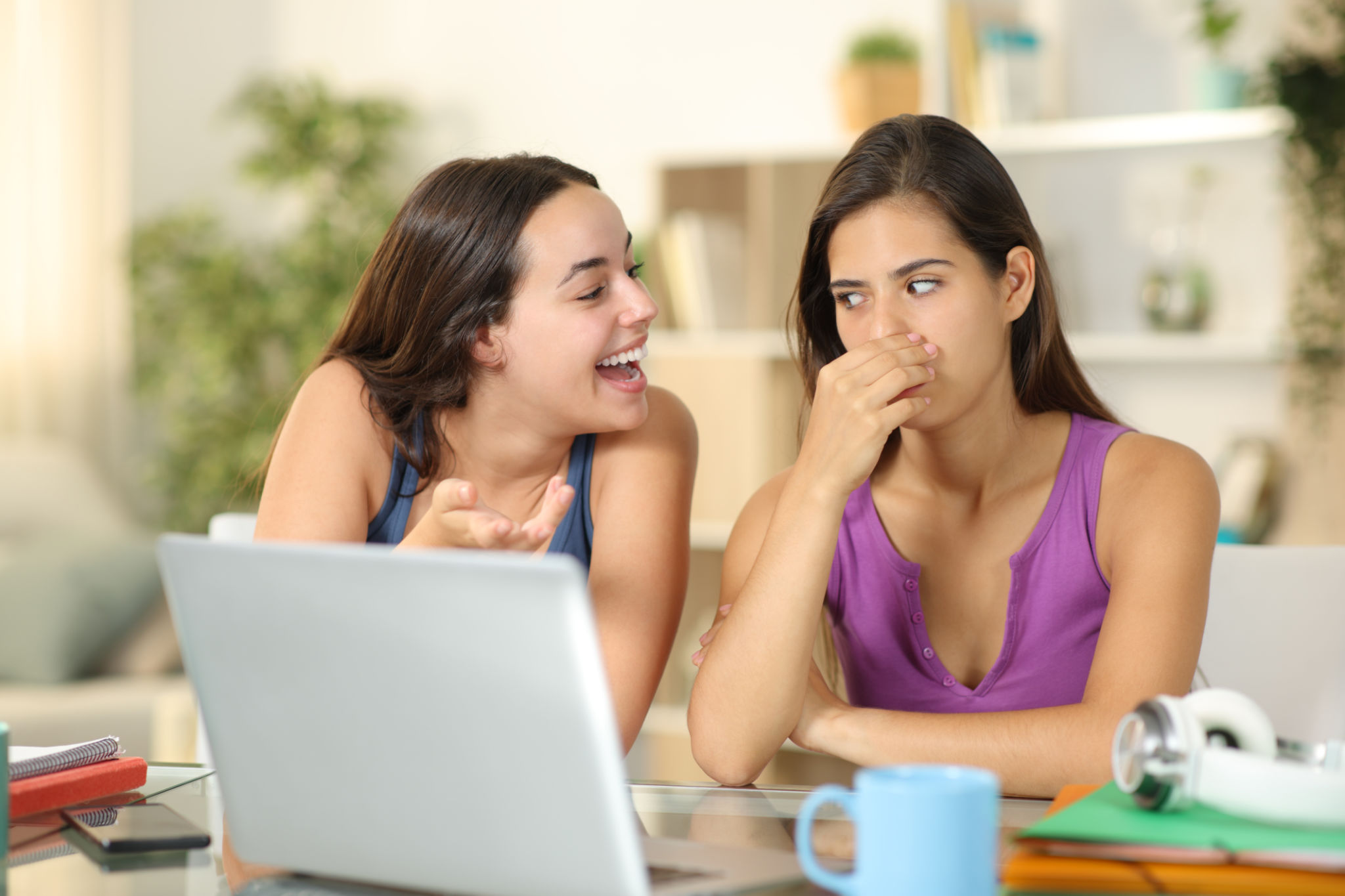 Woman with bad breath talking to friend Woman with bad breath talking to friend
