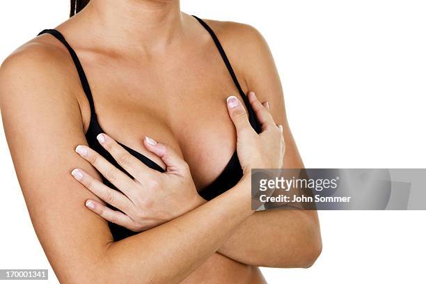 frau mit bh - weibliche brust stock-fotos und bilder