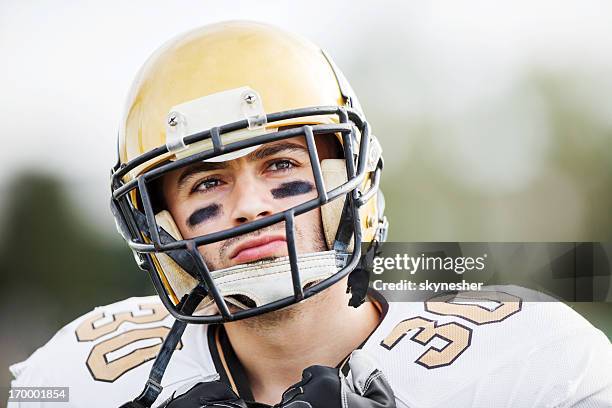 american football player. - football player face stock pictures, royalty-free photos & images