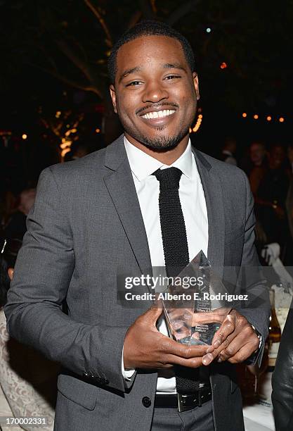 Director Ryan Coogler poses with the Vanguard Award in the audience at the 2013 'Celebrate Sundance Institute' Los Angeles Benefit hosted by Tiffany...