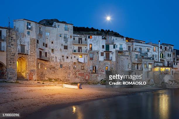 old beach in cefalù at dusk, sicily italy - fishing village stock pictures, royalty-free photos & images