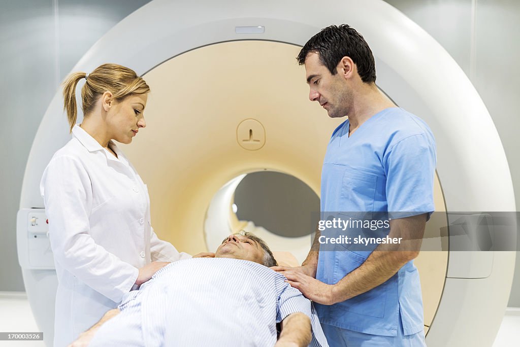 Getting Mri Scan Mature Man Getting A Mri Scan High-Res Stock Photo - Getty Images