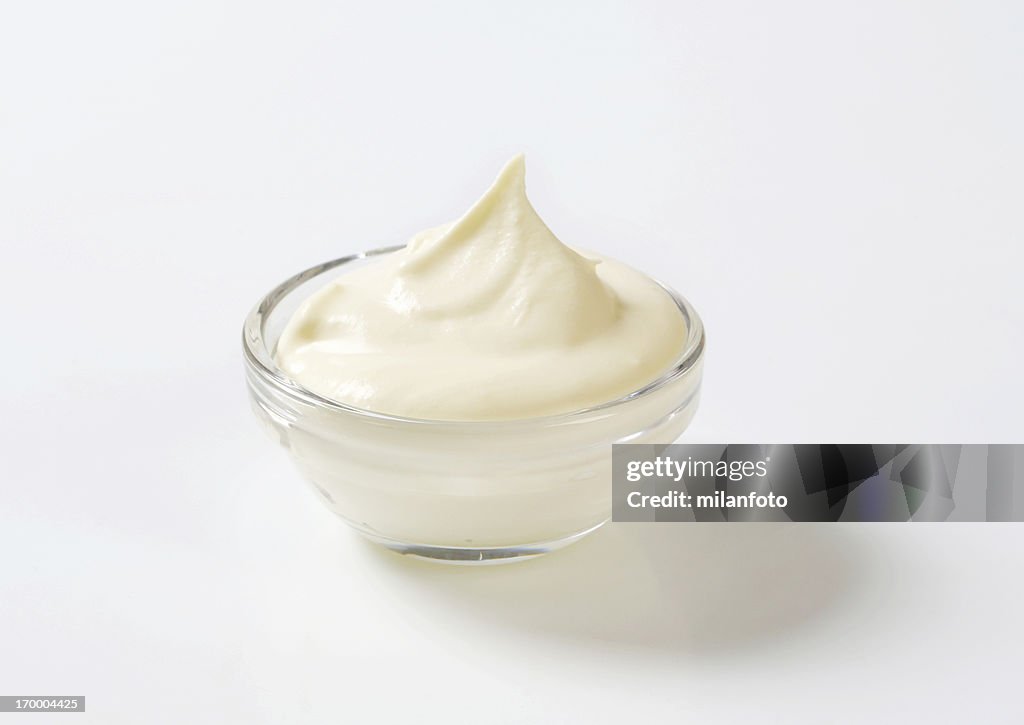 Cream cheese in a glass bowl