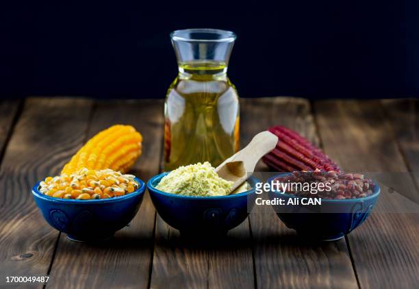 corn oil, corn flour and corn - olio di mais foto e immagini stock