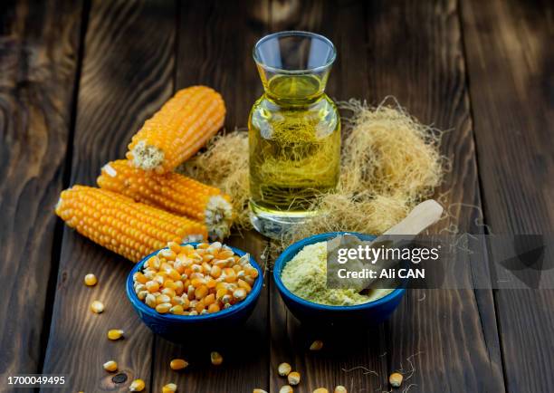 corn oil, corn flour and corn - olio di mais foto e immagini stock