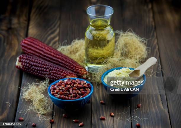 corn oil, corn flour and corn - olio di mais foto e immagini stock