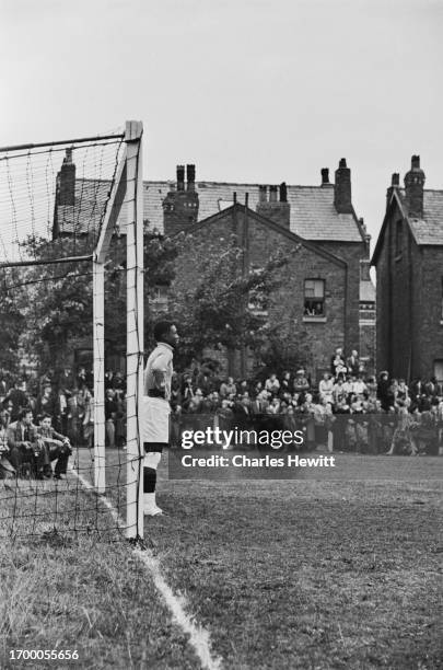 The Nigerian goalkeeper stands by his line during a match between Marine A.F.C. And the Nigeria national football team at Rossett Park, Crosby,...