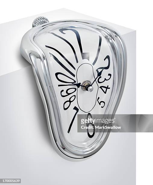 melting clock - salvador dali stock pictures, royalty-free photos & images