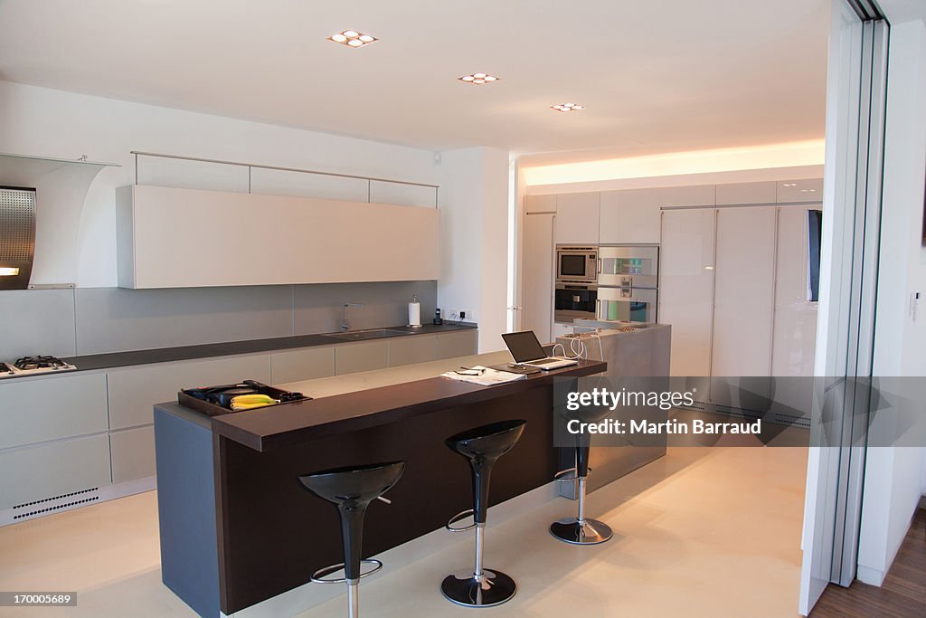 Islands and stools in modern kitchen