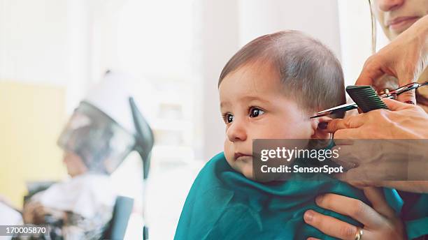 baby at the hairdresser - short hair cut stock pictures, royalty-free photos & images