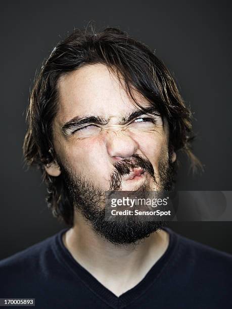 young man grimacing - ugly face stock pictures, royalty-free photos & images