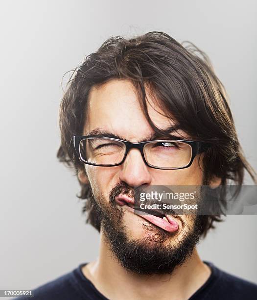 young man grimacing - ugly face stock pictures, royalty-free photos & images