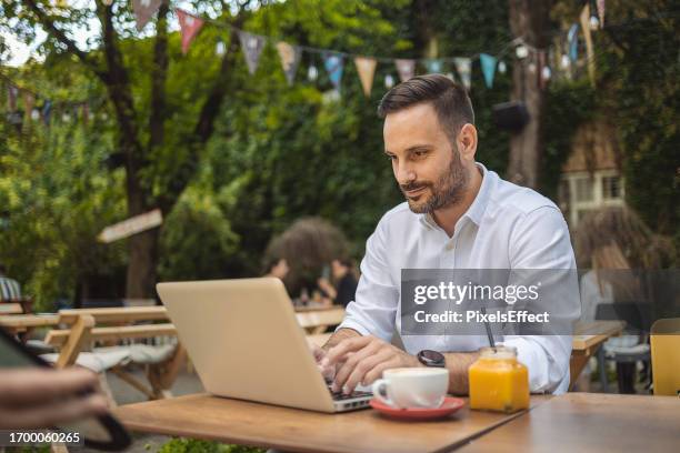 Man Outside Computer 9,673 Outdoor Cafe Computer Stock Photos, High-Res Pictures, and Images ...