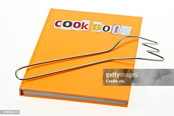 https://media.gettyimages.com/id/170006574/photo/orange-cook-book.jpg?s=612x612&w=gi&k=20&c=MMc8ZO38DRxJZYAO5OpEcy2MugosJLeZAQKmC1haLVw=