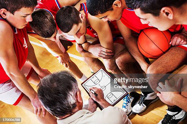 basketball strategy. - basketball sport team stock pictures, royalty-free photos & images