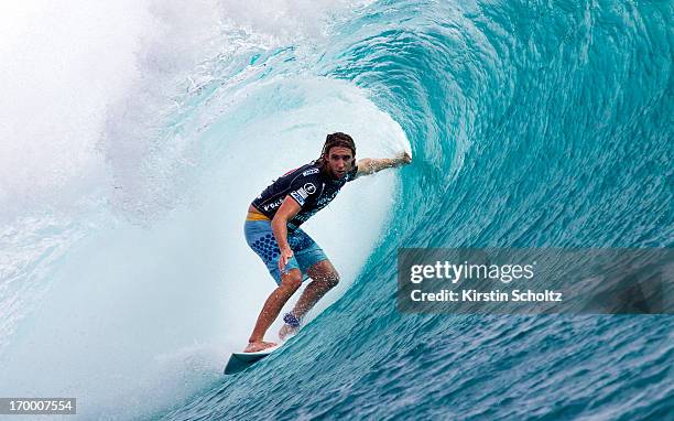 Matt Wilkinson of Australia surfs inside a barrel on June 6, 2013 in Tavarua, Fiji.