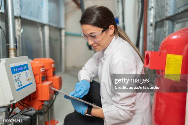 quality control of water storage tank - osmosis stock pictures, royalty-free photos & images