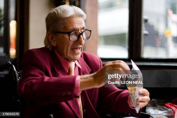 Picture taken on May 22, 2013 shows photographer Ray Bellisario during an interview with AFP in London. The world's press will train their lenses on...