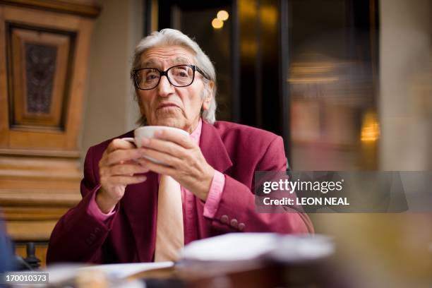 Picture taken on May 22, 2013 shows photographer Ray Bellisario during an interview with AFP in London. The world's press will train their lenses on...