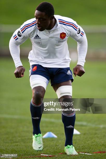 Yannick Nyanga runs through a warm up drill during a France rugby training session at North Harbour Stadium on June 6, 2013 in Auckland, New Zealand.