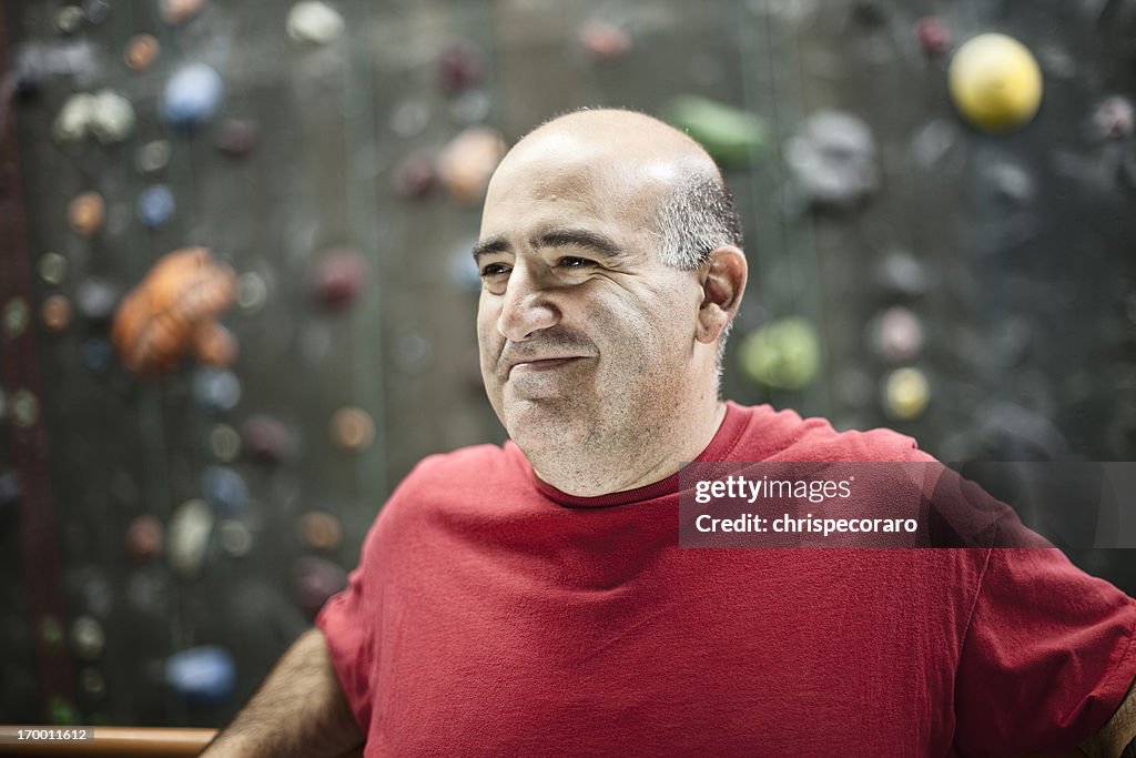 Mature Adult Male Taking a Break at the Gym