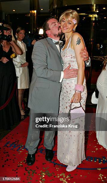 Armin Rohde Kisses wife Angela Baronin Von Schilling at The Arrival For German Film Ball in the Hotel Bayerischer Hof in Munich.