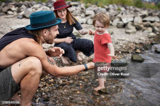 Kid Collecting Rocks 487 Child Collecting Rocks Stock Photos, High-Res Pictures, and Images ...
