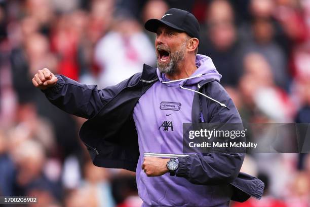 Jurgen Klopp, Head Coach of Liverpool celebrates victory at full time during the Premier League match between Liverpool FC and West Ham United at...