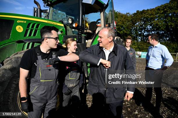 Sir Ed Davey, leader of the Liberal Democrats, chats to pupils during his visit to Sparsholt College Hampshire with the party’s candidate for...