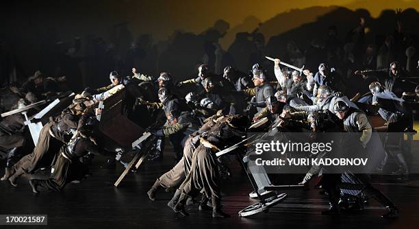 Opera singers perform during the dress rehearsal of the "Prince Igor" opera by Russian composer Alexander Borodin at the Bolshoi theatre in Moscow on...