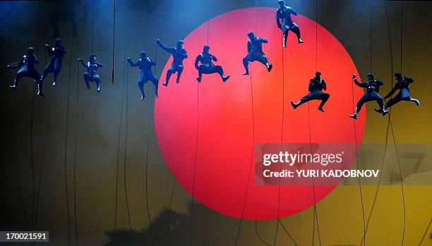 Ballet dancers perform during the dress rehearsal of the "Prince Igor" opera, by Russian composer Alexander Borodin, at the Bolshoi theatre in Moscow...